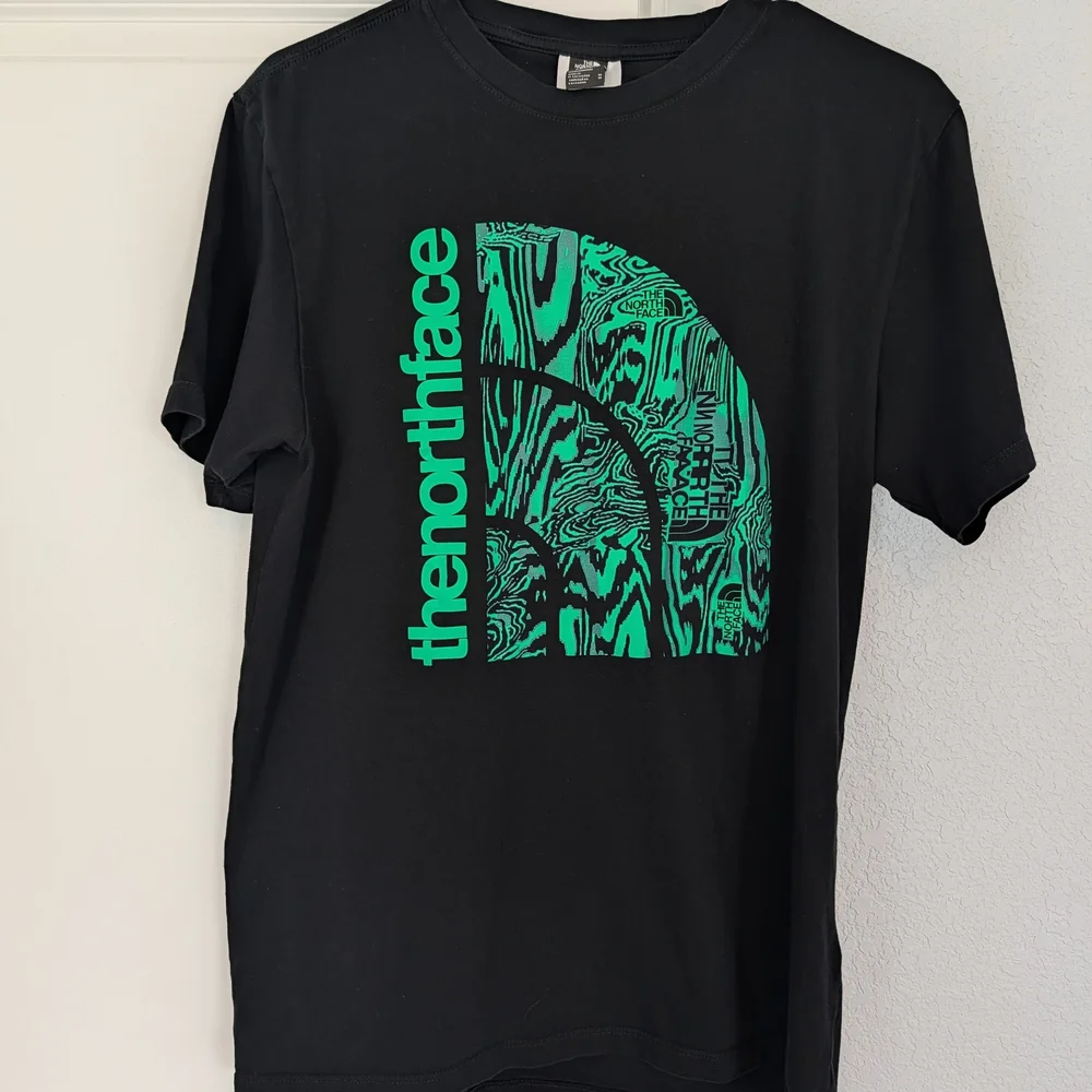The North Face Black T-Shirt with Green Graphic